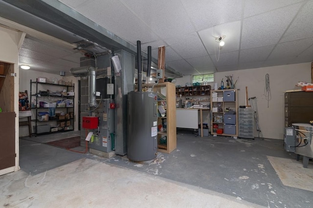 286 Narrow Ave, Westport, MA 02790 - below grade area with electric water heater, heating unit, and a workshop area