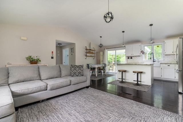 286 Narrow Ave, Westport, MA 02790 - living area featuring dark wood-type flooring and vaulted ceiling