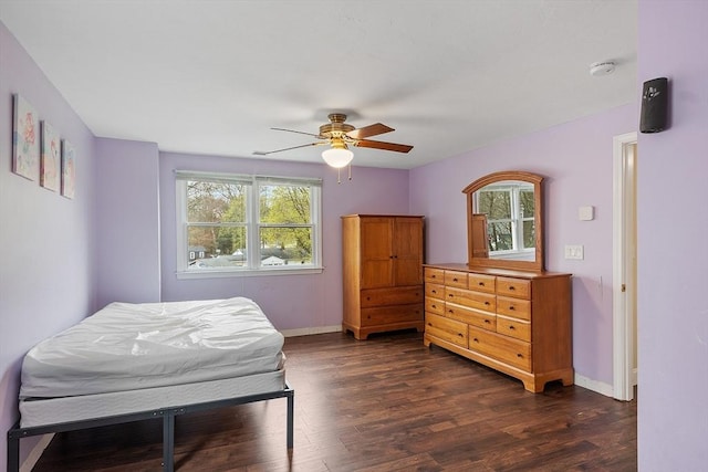 92 Hilltop Rd, Whitman, MA 02382 - bedroom featuring dark wood finished floors, baseboards, and multiple windows