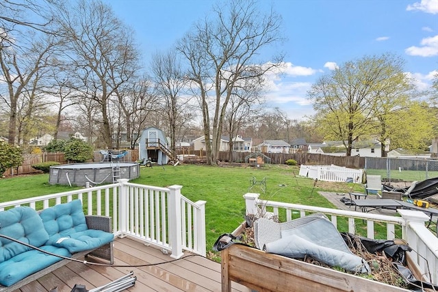 92 Hilltop Rd, Whitman, MA 02382 - wooden terrace featuring a residential view, a fenced in pool, a lawn, and a fenced backyard