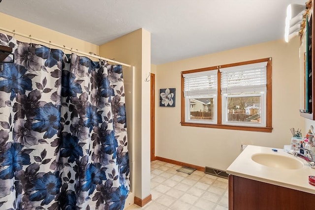 92 Hilltop Rd, Whitman, MA 02382 - bathroom with baseboards, tile patterned floors, vanity, and curtained shower