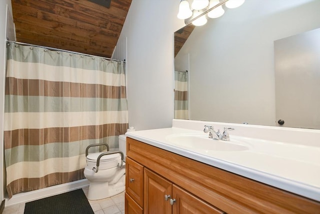 bathroom with tile patterned flooring, vanity, toilet, and vaulted ceiling