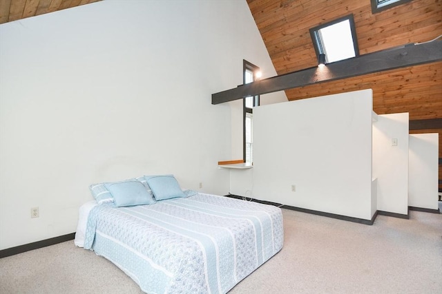 carpeted bedroom featuring multiple windows, high vaulted ceiling, and wood ceiling