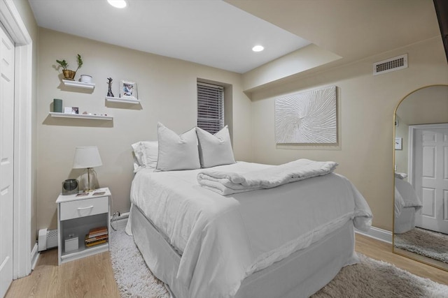 733 E 3rd St, Boston, MA 02127 - bedroom with wood finished floors, recessed lighting, and baseboards