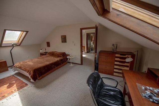 carpeted bedroom with lofted ceiling