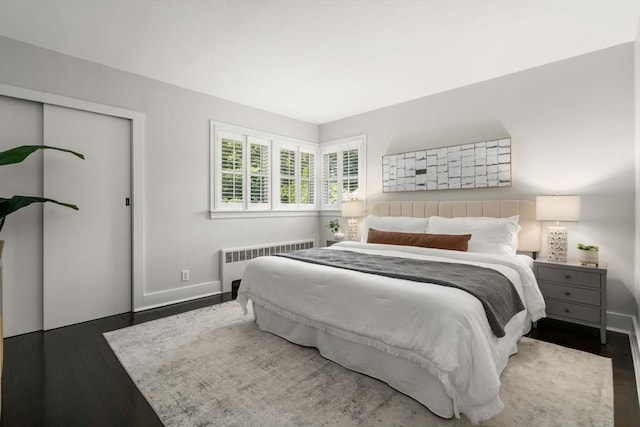 10 Morse Rd, Wayland, MA 01778 - bedroom featuring radiator and wood finished floors