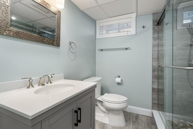 10 Morse Rd, Wayland, MA 01778 - full bath featuring a stall shower, vanity, wood finished floors, and a paneled ceiling
