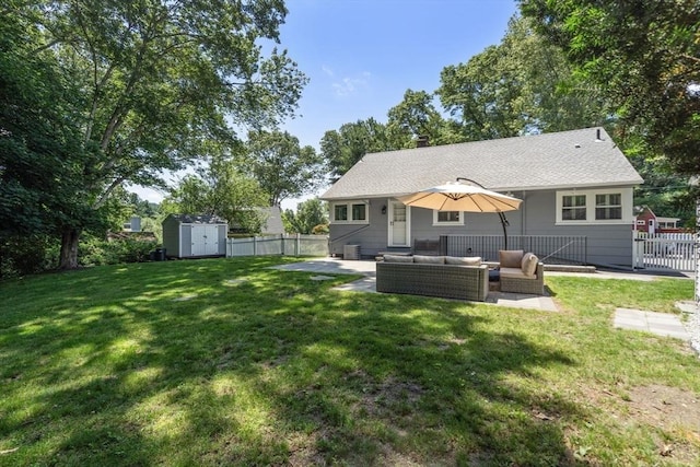 10 Morse Rd, Wayland, MA 01778 - back of property with a shed, a patio area, outdoor lounge area, and a shingled roof