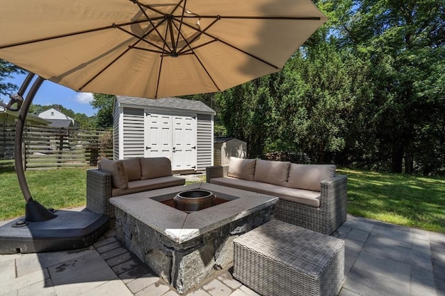 10 Morse Rd, Wayland, MA 01778 - view of patio with a shed and an outdoor living space with a fire pit