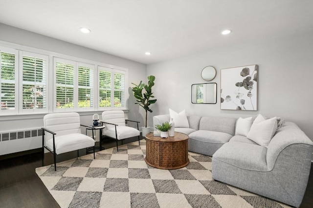 10 Morse Rd, Wayland, MA 01778 - living area with radiator, recessed lighting, and wood finished floors