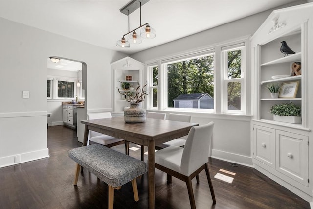 10 Morse Rd, Wayland, MA 01778 - dining room with dark wood-style flooring and arched walkways