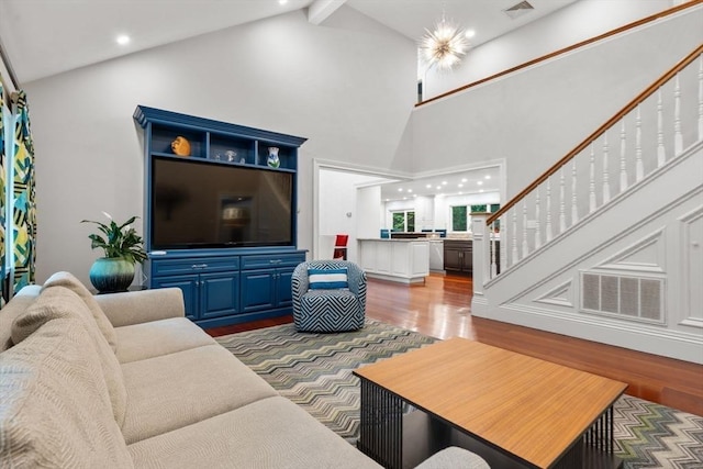 1 Croftdale, Newton, MA 02459 - living area with wood finished floors, high vaulted ceiling, recessed lighting, and beam ceiling