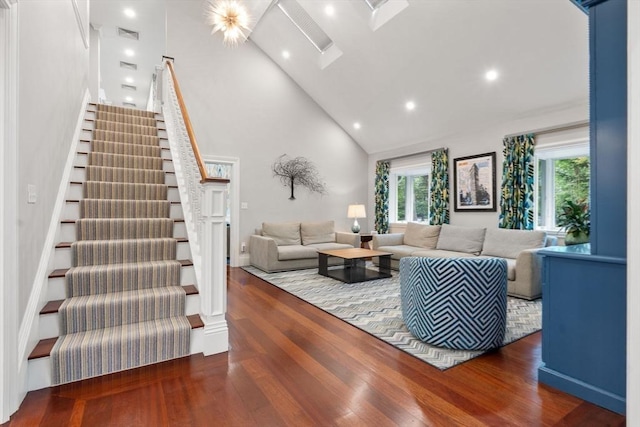 1 Croftdale, Newton, MA 02459 - living area featuring plenty of natural light, high vaulted ceiling, wood finished floors, stairs, and recessed lighting