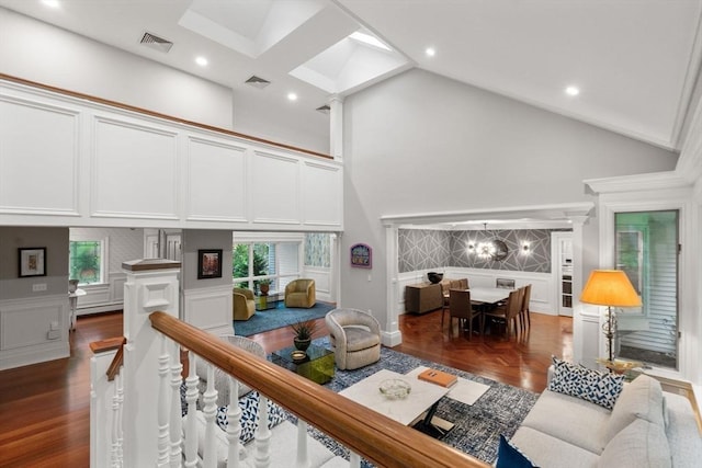 1 Croftdale, Newton, MA 02459 - living room featuring a decorative wall, high vaulted ceiling, wood finished floors, and recessed lighting