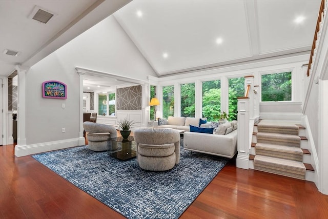 1 Croftdale, Newton, MA 02459 - living area with wood finished floors, high vaulted ceiling, baseboards, stairs, and recessed lighting