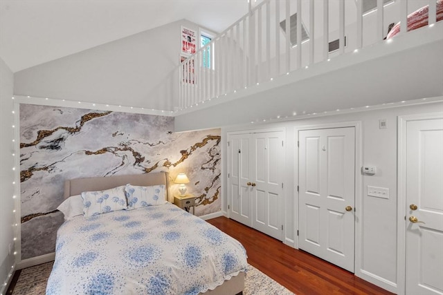 1 Croftdale, Newton, MA 02459 - bedroom with wood finished floors, high vaulted ceiling, baseboards, and two closets