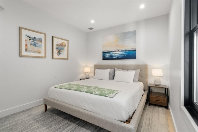 bedroom featuring baseboards, visible vents, and recessed lighting