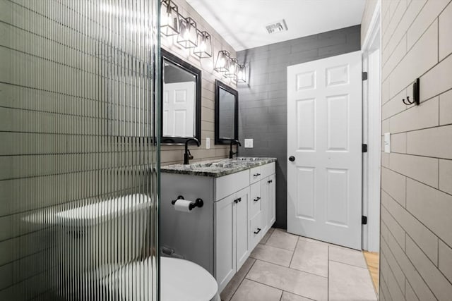 2 Jason Ter, Fairhaven, MA 02719 - bathroom featuring tile walls, vanity, tile patterned floors, and toilet