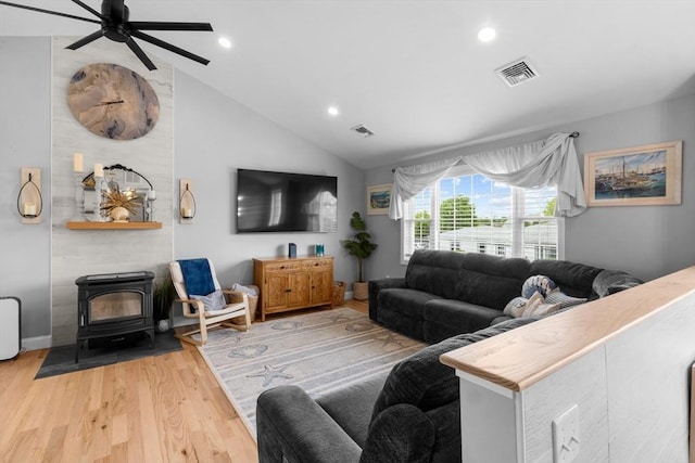 2 Jason Ter, Fairhaven, MA 02719 - living area featuring a wood stove, light wood-type flooring, a ceiling fan, vaulted ceiling, and recessed lighting