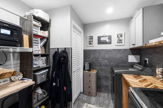 2 Jason Ter, Fairhaven, MA 02719 - bathroom with tile walls, a wainscoted wall, and independent washer and dryer