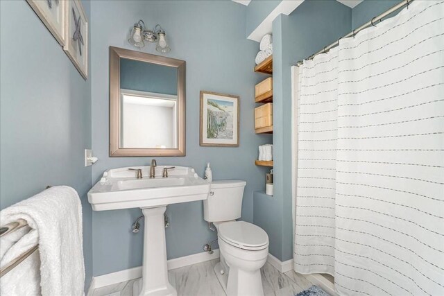 33 Freeman Dr, Plymouth, MA 02360 - full bath with toilet, marble finish flooring, baseboards, and a shower with shower curtain