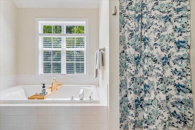 33 Freeman Dr, Plymouth, MA 02360 - bathroom featuring a bath and a shower with shower curtain