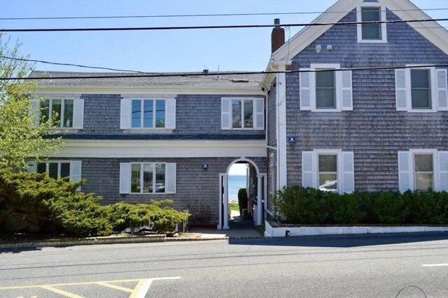 495 Commercial St Unit 9, Provincetown, MA 02657 - view of front of home featuring a chimney