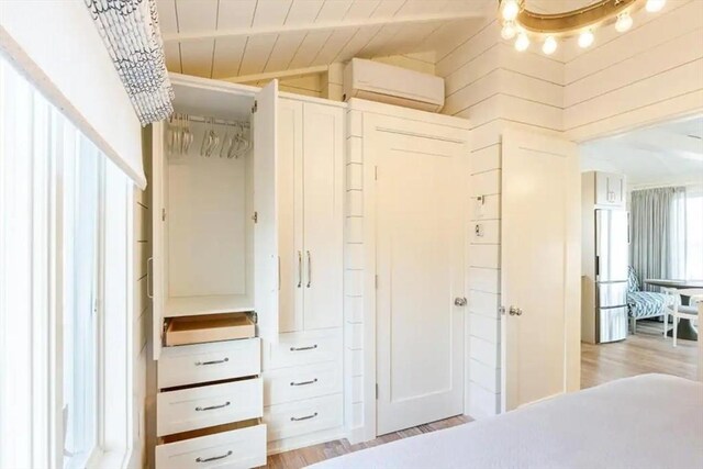 495 Commercial St Unit 9, Provincetown, MA 02657 - closet with a wall mounted air conditioner