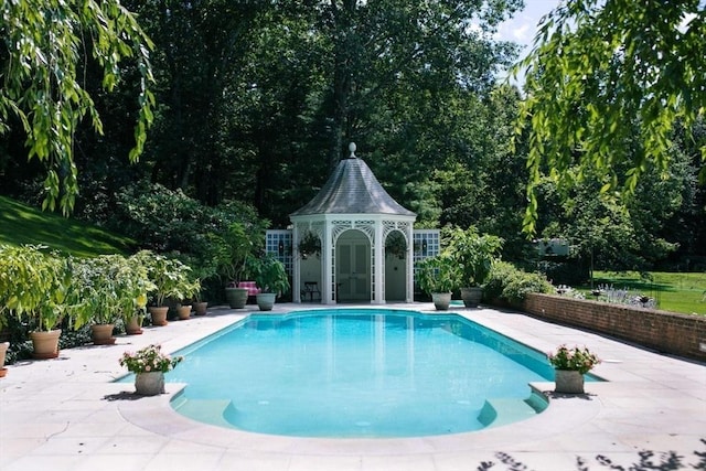 pool featuring a patio area