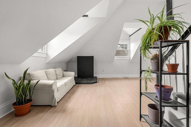 256 Lafayette St Unit 3, Salem, MA 01970 - bonus room featuring wood finished floors, a skylight, and vaulted ceiling