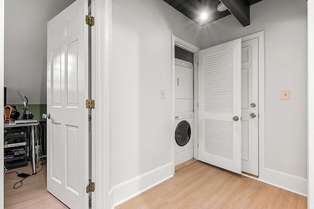 256 Lafayette St Unit 3, Salem, MA 01970 - laundry area featuring estacked washer and dryer and light wood-style floors