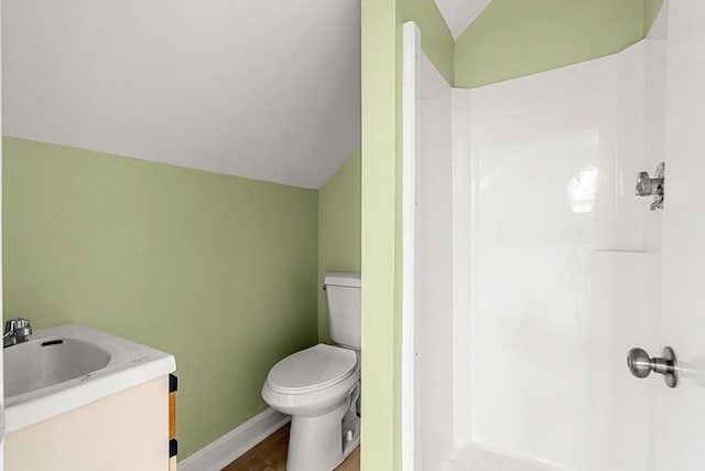 256 Lafayette St Unit 3, Salem, MA 01970 - full bathroom featuring lofted ceiling, a shower, wood finished floors, and vanity