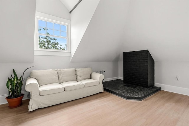 256 Lafayette St Unit 3, Salem, MA 01970 - living area featuring vaulted ceiling and wood finished floors