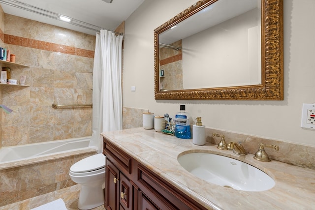 full bathroom featuring shower / tub combo with curtain, vanity, and toilet