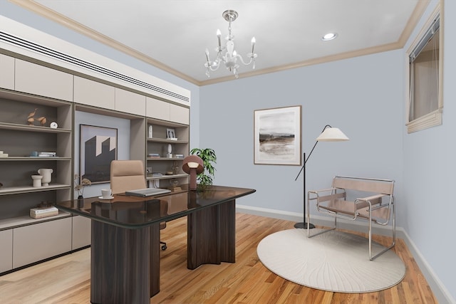 office featuring a notable chandelier, light wood-type flooring, and crown molding