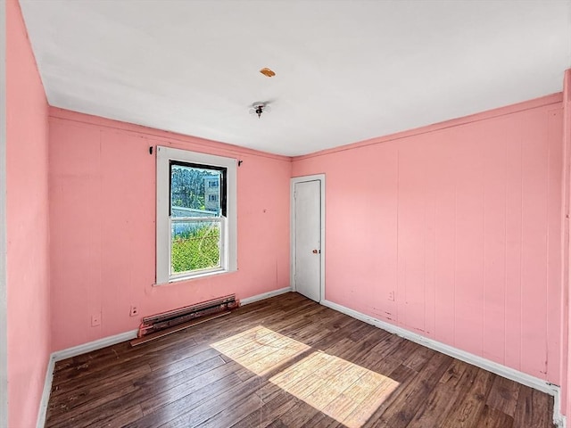 19 High St, Lynn, MA 01902 - spare room with wood finished floors and baseboard heating