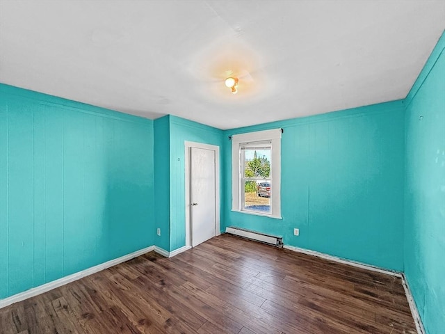19 High St, Lynn, MA 01902 - spare room featuring a baseboard radiator and wood finished floors