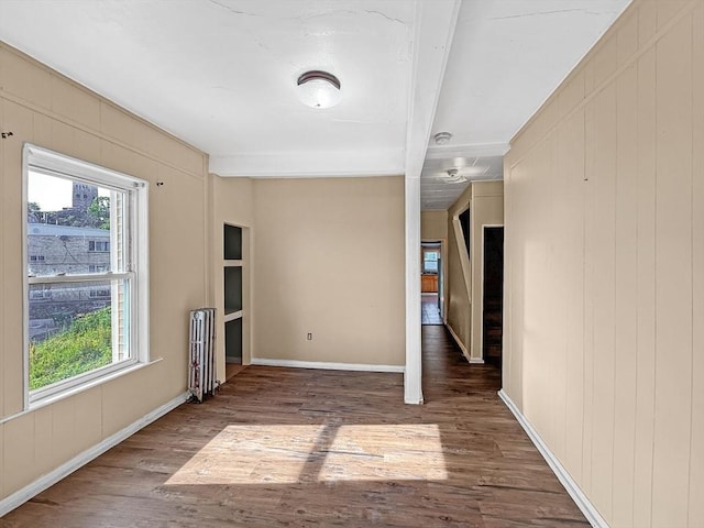 19 High St, Lynn, MA 01902 - unfurnished room featuring wood finished floors and baseboards