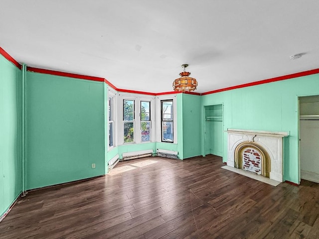 19 High St, Lynn, MA 01902 - unfurnished living room with wood finished floors, crown molding, a chandelier, and a fireplace
