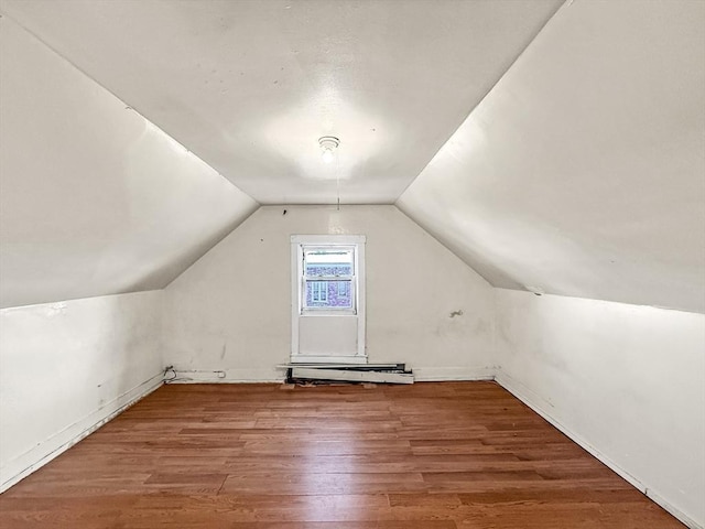 19 High St, Lynn, MA 01902 - additional living space featuring wood finished floors, lofted ceiling, and a baseboard radiator