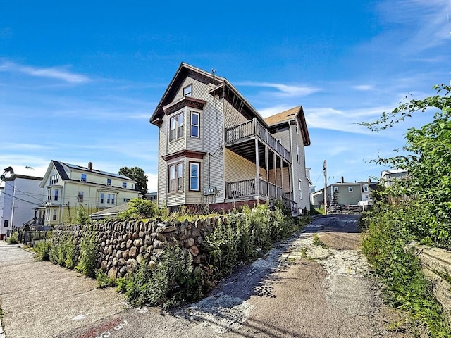19 High St, Lynn, MA 01902 - view of side of home with a balcony and a residential view