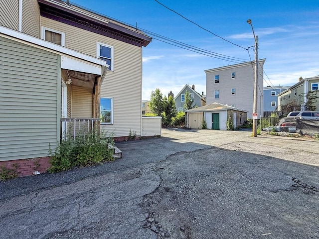 19 High St, Lynn, MA 01902 - view of home's exterior featuring a residential view and a storage shed