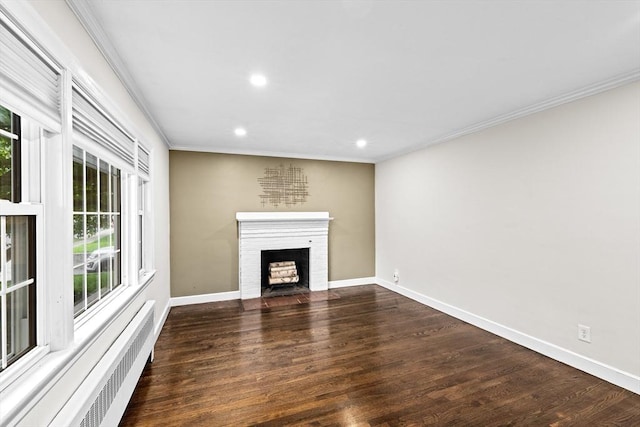 181 Manchester St, Boston, MA 02126 - unfurnished living room with radiator heating unit, recessed lighting, plenty of natural light, wood finished floors, and crown molding