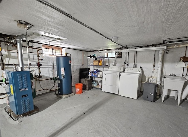 181 Manchester St, Boston, MA 02126 - basement featuring water heater, washing machine and clothes dryer, and a heating unit