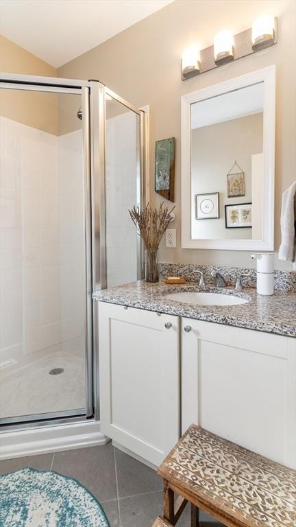 60 Wright St, Arlington, MA 02474 - bathroom with tile patterned floors, a shower stall, and vanity