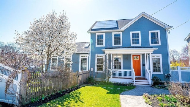 60 Wright St, Arlington, MA 02474 - view of front of house featuring covered porch and roof mounted solar panels
