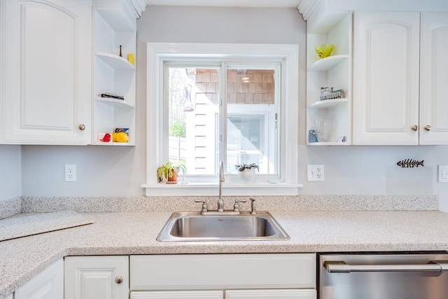 18 Tupelo, Harwich, MA 02645 - kitchen featuring open shelves, stainless steel dishwasher, a sink, and white cabinetry