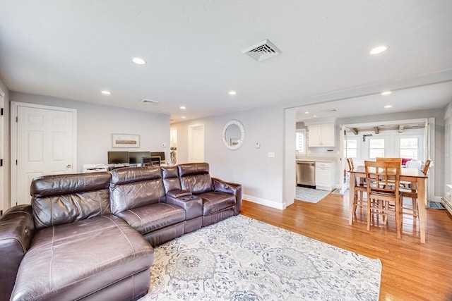 18 Tupelo, Harwich, MA 02645 - living room featuring recessed lighting, light wood-style flooring, and baseboards