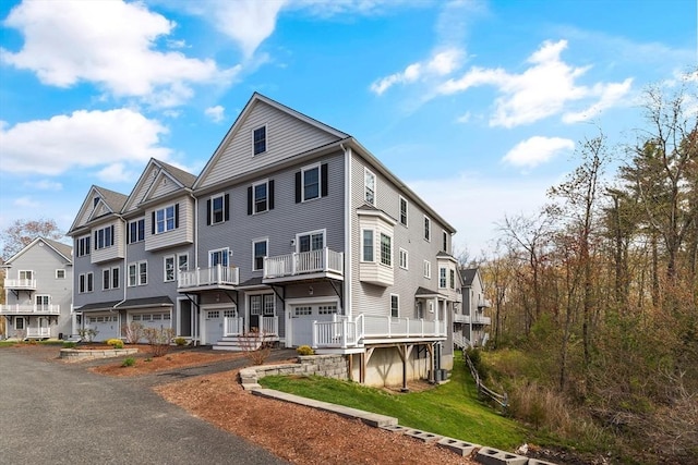30 Compass Pt Unit 30, North Andover, MA 01845 - view of property featuring a residential view and a garage