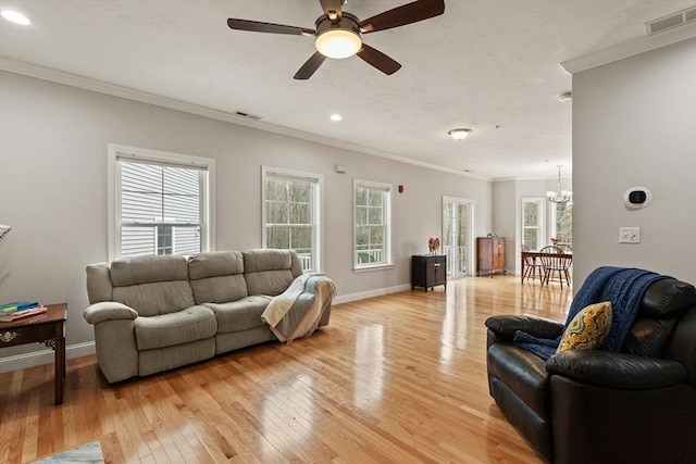 30 Compass Pt Unit 30, North Andover, MA 01845 - living area featuring ornamental molding, light wood-style floors, a chandelier, recessed lighting, and a ceiling fan